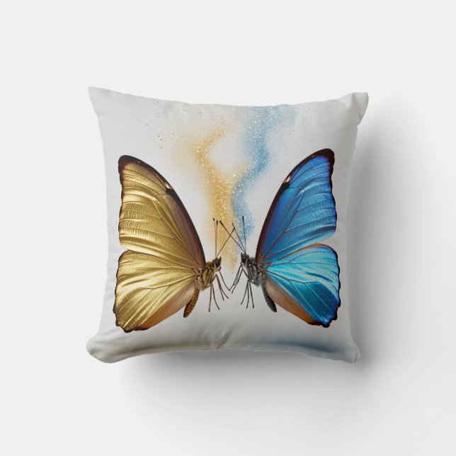 Una foto de un cojín con forma de mariposa o (Anverso)
