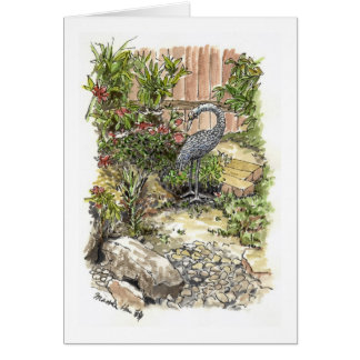 Una garza sola en un patio trasero