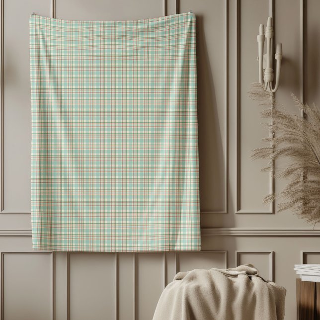 Una manta de plástico verde rojo en suaves tonos p (Red Green Plaid Blanket in Gentle Pastel Tones)