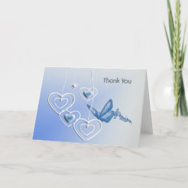 Una mariposa y corazones