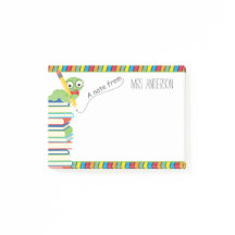 Una nota del profesor con un librogusano