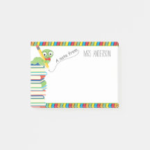 Una nota del profesor con un librogusano