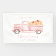 Una pancarta de camión rosa para baby shower de un