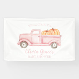 Una pancarta de camión rosa para baby shower de un