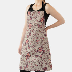 Una persona lleva un delantal con estampado floral