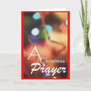 Una tarjeta de ornamento de oración de los Navidad