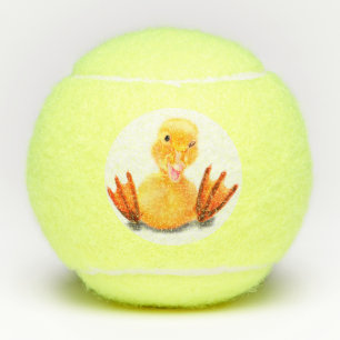 Unas divertidas bolas de tenis Feliz Pato Amarillo