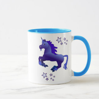 Unicornio azul del dibujo animado y taza de las