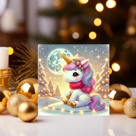 Unicornio bajo el cielo de Navidad iluminado por l