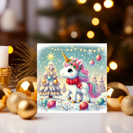 Unicornio decorando un árbol de Navidad