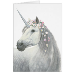 Unicornio del alcohol con las flores en melena
