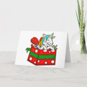 Unicornio del navidad en caja de regalo
