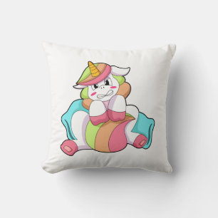 Unicornio tímido con almohada