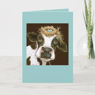 vaca con tarjeta de gorra de nido