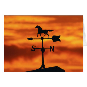 Vane del clima al atardecer