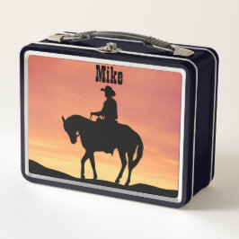 Vaquero a caballo al atardecer