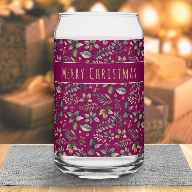 Vaso Con Forma De Lata Navidades de impresión botánica rojo profundo pers (An elegant Christmas drinks glass with botanical leaves and berries pattern on a burgundy background)