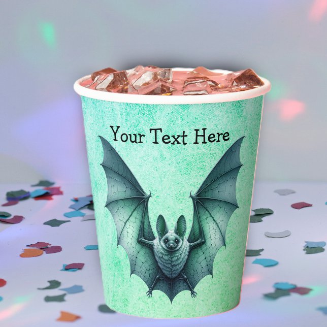 Vasos De Papel Halloween Blue Green Flying Bat Furry Body (Flying bluish green bat furry body on mix of blues greens Halloween paper party cup.)