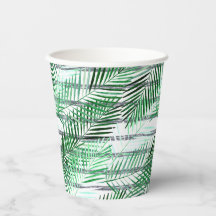 Hojas de palma sobre un fondo blanco y negro rayad