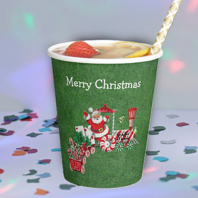 Vasos De Papel Navidades de Santa Riding Entrenan Cartas de Candy (Santa riding Christmas train candy canes, letters on green paper party cups.)