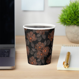 Vasos De Papel Orange and brown flowers on a black background.