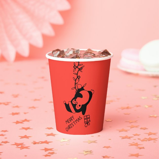 Vasos De Papel Penguine distributing christmas gifts (in situ)