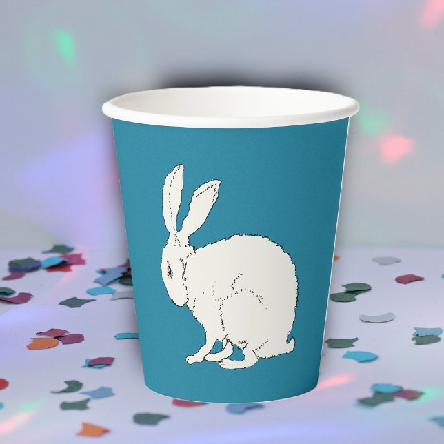 Vasos De Papel Sentando el Ilustracion simple de Conejo Blanco so (Minimalist illustration of sitting white rabbit on dark blue party drinking paper cups.)