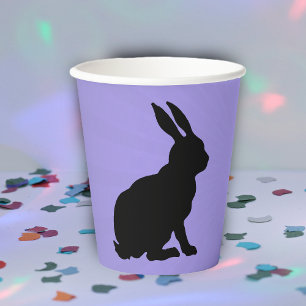 Vasos De Papel Silueta negra sentando al conejito con las orejas 