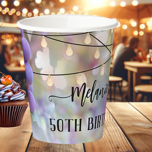 Vasos De Papel Uvas y String Lights Festimes Cumpleaños (Festive paper cups featuring colorful grapes and string lights. Beautiful for a birthday celebration)