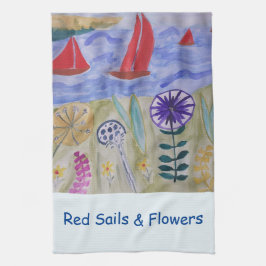 Vela roja y toalla de té con flores