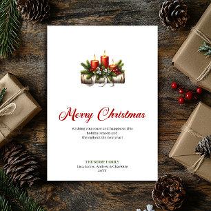 Velas elegantes de Navidad con bayas de acebo salu