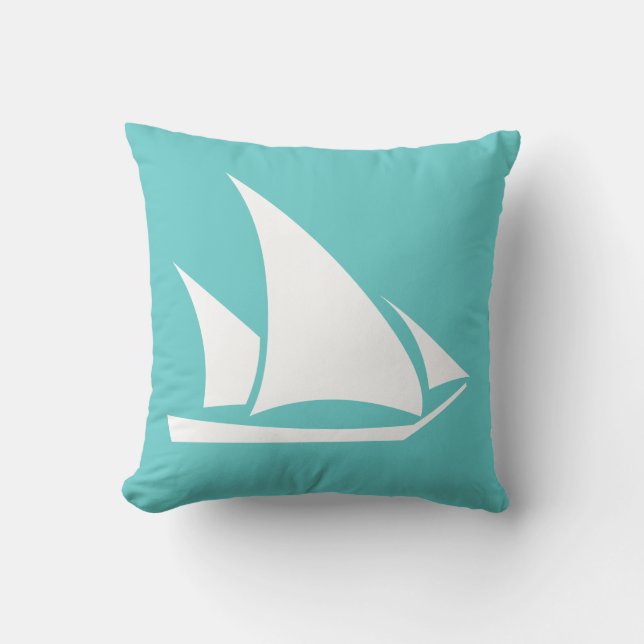 velero blanco sobre almohada azul turquesa (Anverso)