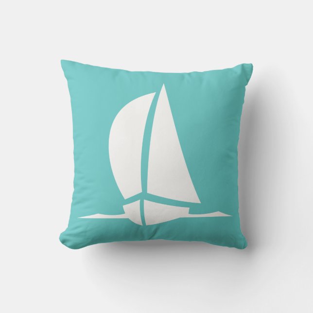 velero blanco sobre almohada azul turquesa (Anverso)