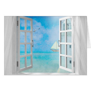 velero y faro en la ventana del Día del Nombre