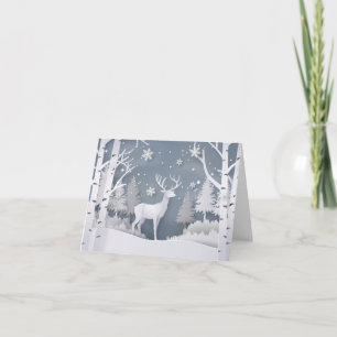 Venado de papel en bosque de invierno