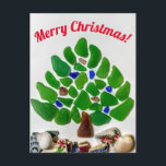 Vidrio verde Washington bebe árbol de Navidad<br><div class="desc">Dé esta postal navideña de cristal de mar esta temporada navideña a todos sus amigos y familia amantes de la playa. Este árbol verde fue hecho a mano a partir de cristales de mar encontrados en las Islas San Juan de Washington. Personalizar como quieras. Para ver estos y más productos,...</div>