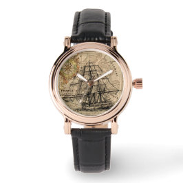 Viejo barco de vela y reloj de pulsera de mapas