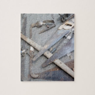 Viejo rompecabezas de la foto de la herramienta