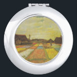Vincent Van Gogh Tulip Fields regalo espejo compac<br><div class="desc">Vincent Van Gogh Tulip Fields Compact Mirror Gift Tulip Fields, también conocido como Flower Beds in Holland, es una pintura al óleo creada por Vincent van Gogh a principios de 1883. Fue donada a la Galería Nacional de Arte en Washington DC en 1983. Bulb Fields era el primer cuadro del...</div>