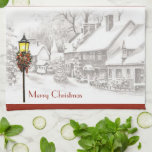 Vintage Christmas Town Kitchen Toalla<br><div class="desc">Toalla de cocina de vacaciones con boceto en blanco y negro de un pueblo victoriano - el único color es el de la lámpara de la calle y la decoración navideña.</div>