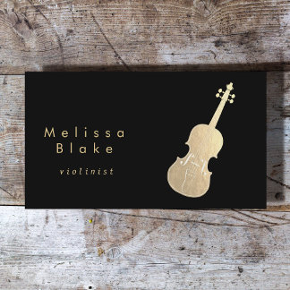 violín de oro falso en tarjeta de visita negra