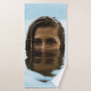 Woman in body of water in the morning