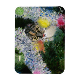 Y un gato en un imán de árbol de Navidad