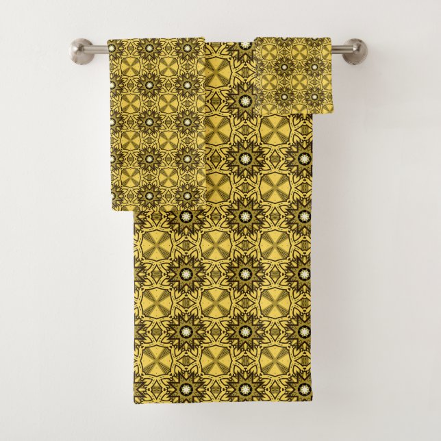 Yellow towels with black geometric patterns (In situ)