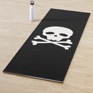 Yoga Cráneo pirata blanco sobre esterilla negra de yog
