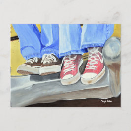 Zapatos antiguos y tarjeta postal antigua